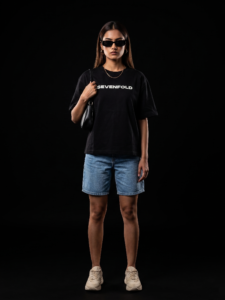 "Bold Legacy oversized boxy fit tshirt female front view SEVENFOLD text black tshirt"