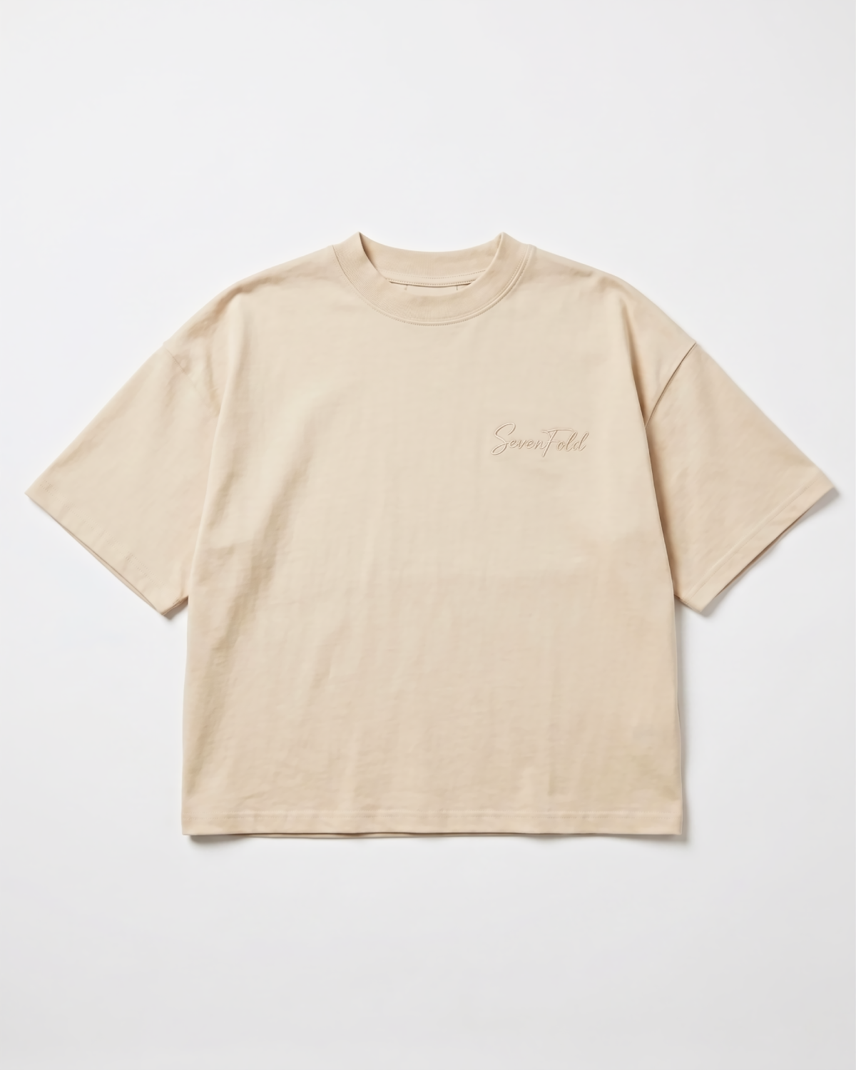 Sevenfold Quiet Crop Tee in Beige - Front Editorial Shot with Black Trousers | Drop 003